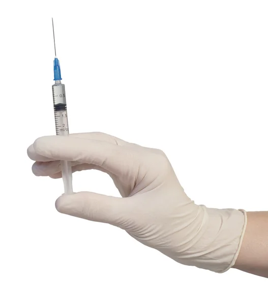 Hand holding syringe — Stock Photo, Image
