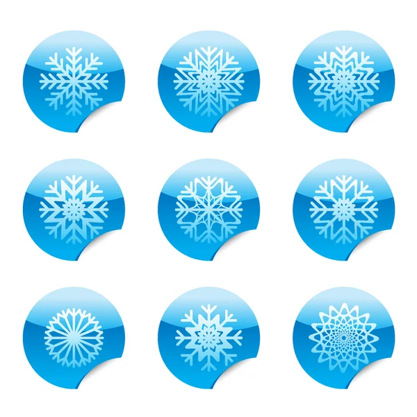 Flocos de neve vetoriais conjunto de círculo adesivos brilhantes com canto . — Vetor de Stock