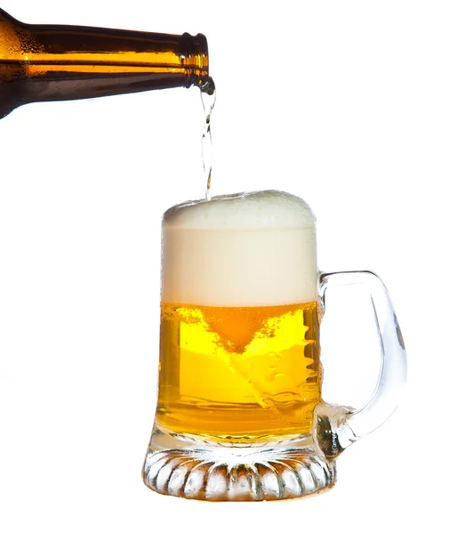 Pouring beer isolated on white — Stock Photo, Image