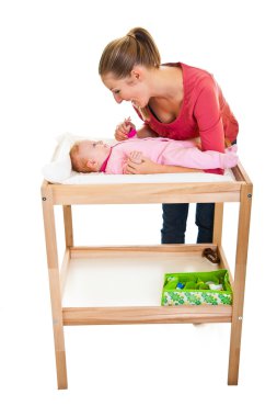 Mother with baby girl isolated on white