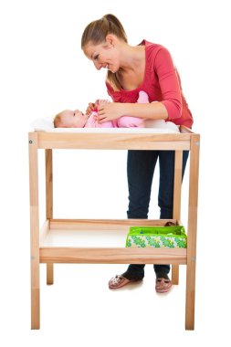 Mother with baby girl isolated on white