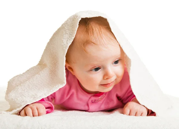 Kojenecká dívka drží hlavu izolovaných na bílém — Stock fotografie