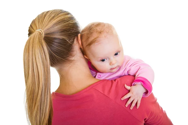 Mamma anläggning spädbarn flicka isolerad på vit — Stockfoto