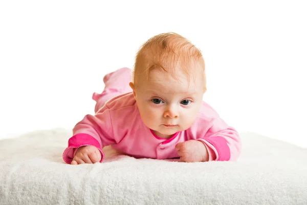 Infant girl holding head isolated on white — Stok fotoğraf