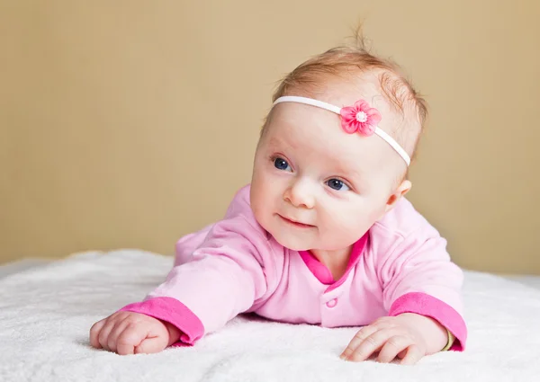 Beutiful infant baby girl in studio — Stock Photo, Image