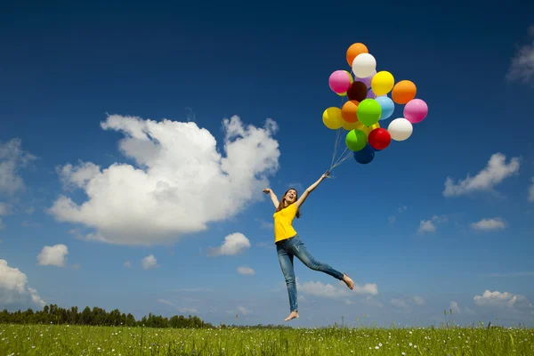 Flying with balloons — Stock Photo, Image