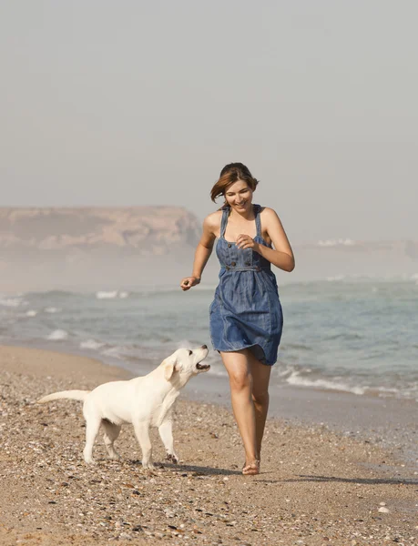 Girl with her dog — Stock Photo, Image