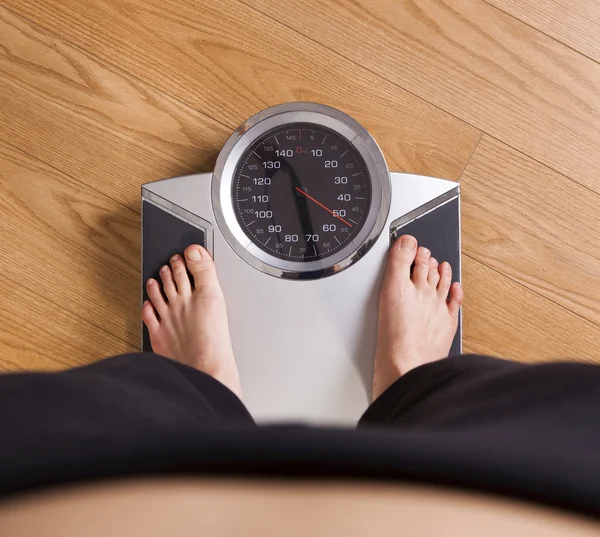 Измерение веса — стоковое фото