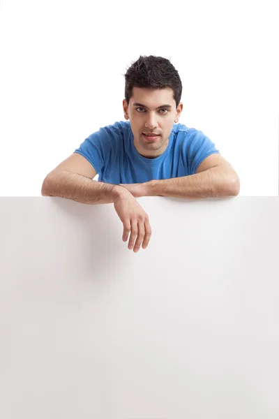 Man holding a blank billboard — Stock Photo, Image