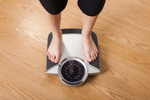 Измерение веса — стоковое фото