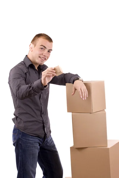 Człowiek z zapakowane pudełko — Zdjęcie stockowe