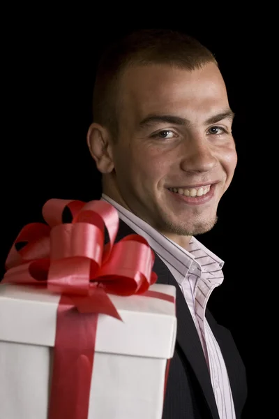 Muž zabalený dárkový box — Stock fotografie