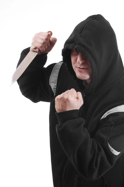 Bandido em preto com faca — Fotografia de Stock