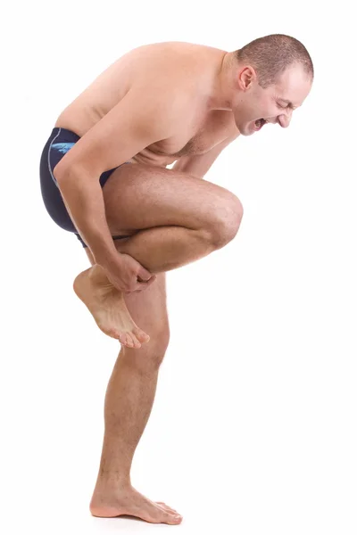 Onun bacak ağrısı olan adam — Stok fotoğraf