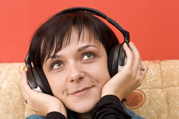 Mulher com fones de ouvido — Fotografia de Stock