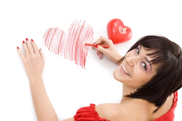 Woman drawing heart-shape Royalty Free Stock Images
