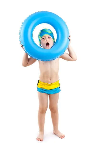 Boy playing with blue life ring — 图库照片