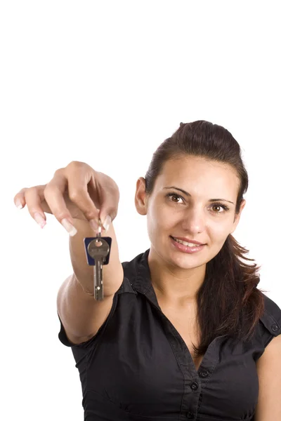 Mulher mostrando chave — Fotografia de Stock