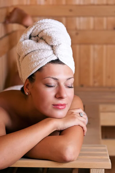 Woman relaxing in the sauna — Stock Photo, Image