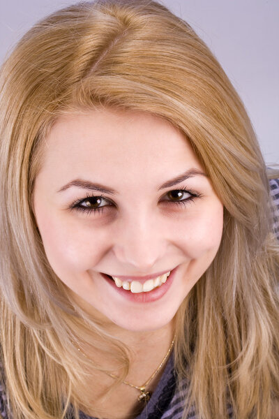 Atractive blonde smiling woman portrait
