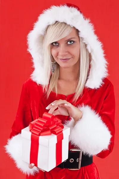 Girl holding a gift Royalty Free Stock Images