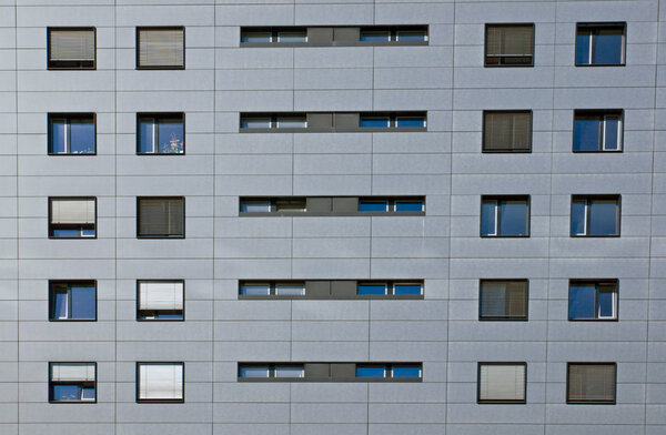 Detail of a silver greyish office building