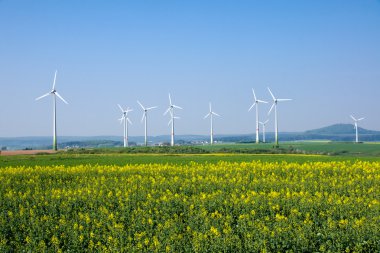 Windwheels in rural Germany clipart