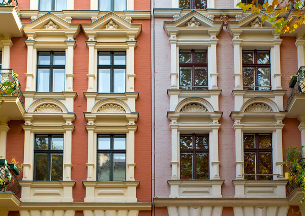 Windows of two rehabilitated townhouses in Berlin