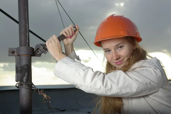 stock image Girl with a wrench