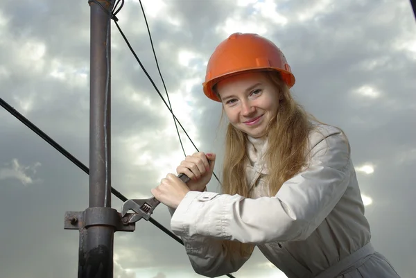 stock image Smiling female with a wrench