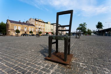 Chair monument in Krakow. clipart