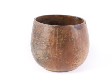 Clay pot of brown color on a white background