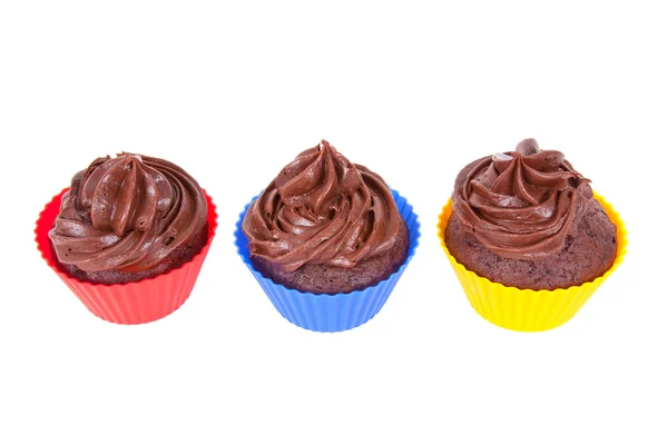Três cupcakes de chocolate — Fotografia de Stock