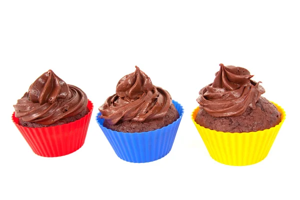 Três cupcakes de chocolate — Fotografia de Stock