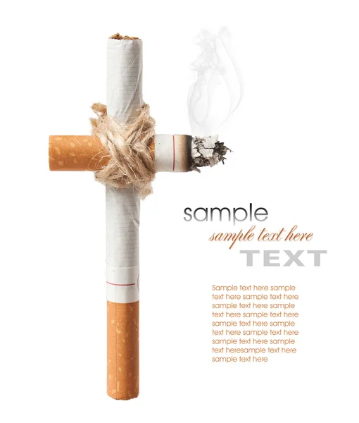 Graveyard cross from cigarettes — Stock Photo, Image