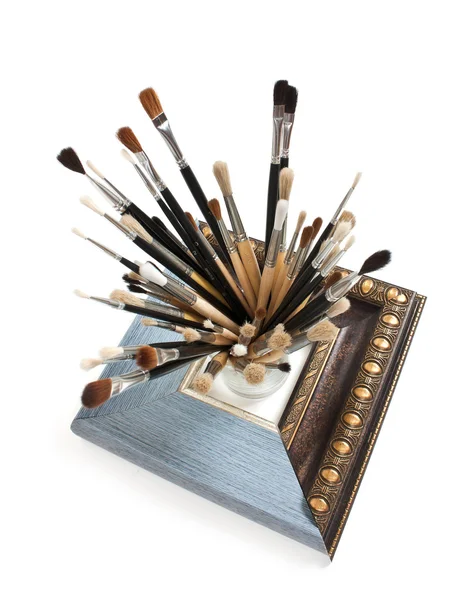 Brushes and frame — Stock Photo, Image