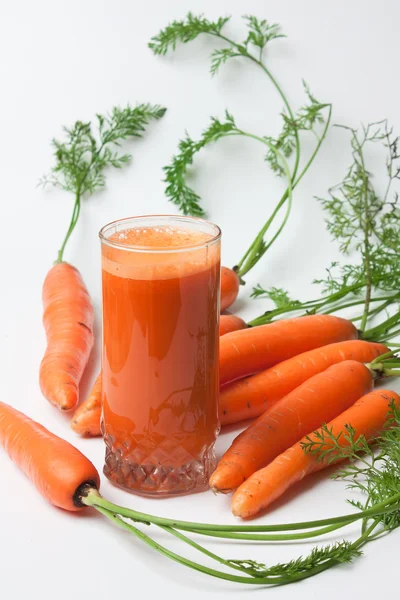 Carrots and carrot juice — Stock Photo, Image