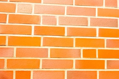 Fake ocher brick wall siding clipart