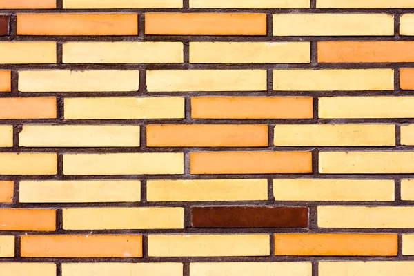 Fake colorful brick wall siding — Stock Photo, Image
