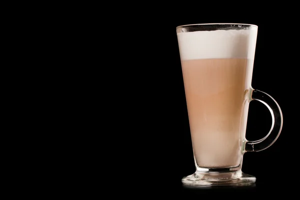 Glass of latte over black background — Stock Photo, Image