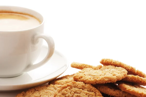 Šálek kávy a ovesné vločky cookies — Stock fotografie