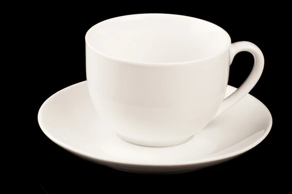 黒の上の白いカップ — ストック写真
