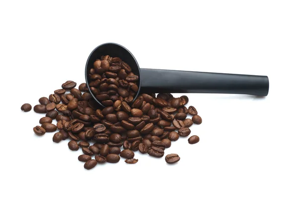 Siyah sspoon ile kahve bitkileri yığın — Stok fotoğraf