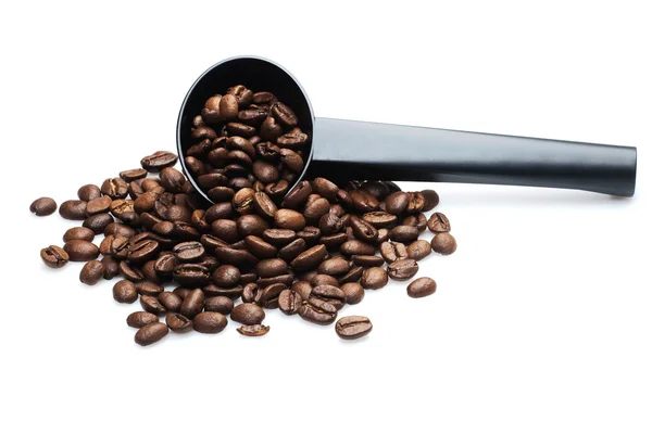 Haldy plodin kávy s černými sspoon — Stock fotografie