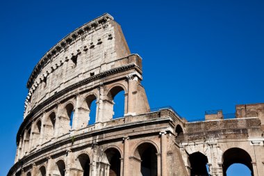 Colosseum with blue sky clipart