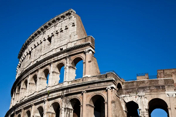 Colosseum with blue sky Stock Picture