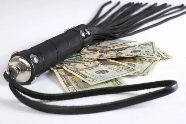 Black Leather Flogging Whip and money on white background. Not i — Stock Photo, Image