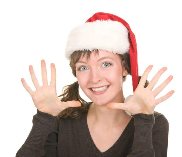Junges Mädchen mit Weihnachtsmütze — Stockfoto