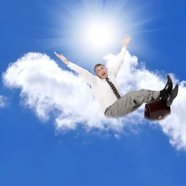 Businessman over cloud — Stock Photo, Image