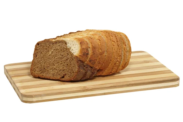 Frisches Brot in Scheiben auf Schneidebrett. — Stockfoto